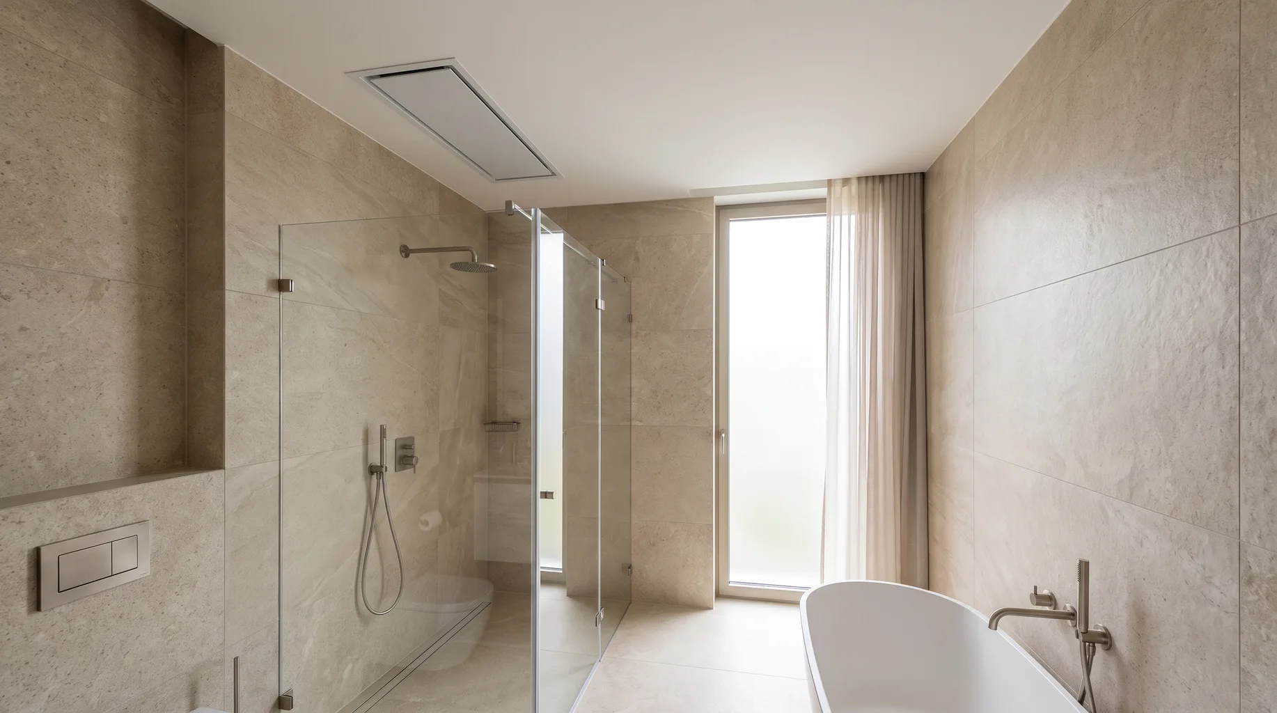 Finished luxury bathroom with a flush ceiling-mounted extract grille positioned discreetly above the shower area